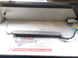Used Oil cooler steering unit BMW 5 serie (E60) 530i 24V Price on request offered by Autodemontage Joko B.V.