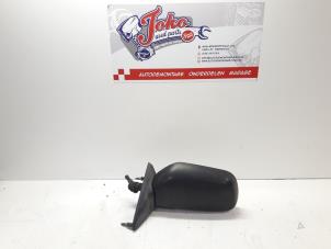 Used Wing mirror, left Mitsubishi Colt (C5) 1.3 8V Kat. Price on request offered by Autodemontage Joko B.V.