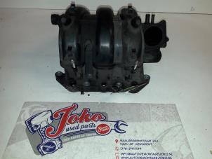 Ansaugbrugge van een Volkswagen Polo IV (9N1/2/3) 1.2 12V 2007