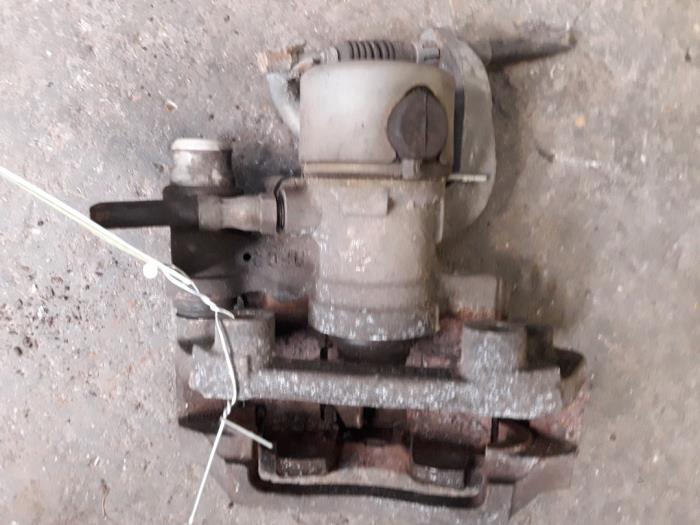 Rear brake calliper, left from a Ford Cougar (ECX/W)