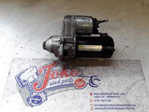 Used Starter Opel Corsa C (F08/68) 1.2 16V Twin Port Price on request offered by Autodemontage Joko B.V.