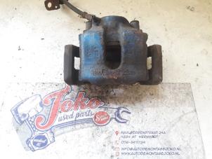 Used Front brake calliper, left BMW 3 serie Compact (E46/5) 325ti 24V Price on request offered by Autodemontage Joko B.V.