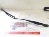 Front wiper arm from a Fiat Doblo Cargo (263), 2010 / 2022 1.3 MJ 16V DPF Euro 5, Delivery, Diesel, 1.248cc, 66kW (90pk), FWD, 263A2000, 2010-02 / 2022-07, 263ZXC1 2011