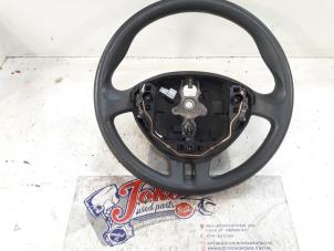 Used Steering wheel Renault Clio III (BR/CR) 1.5 dCi 75 FAP Price on request offered by Autodemontage Joko B.V.
