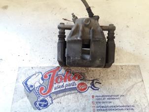 Used Front brake calliper, right Renault Clio III (BR/CR) 1.5 dCi 75 FAP Price on request offered by Autodemontage Joko B.V.