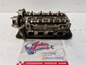 Used Cylinder head Opel Meriva 1.4 16V Ecotec Price on request offered by Autodemontage Joko B.V.