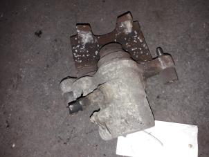 Used Rear brake calliper, left Ford Focus 2 1.8 TDCi 16V Price on request offered by Autodemontage Joko B.V.