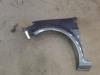Front wing, left from a Renault Clio III (BR/CR), 2005 / 2014 1.4 16V, Hatchback, Petrol, 1.390cc, 72kW (98pk), FWD, K4J780, 2005-06 / 2012-12, BR0A; BR1A; CR0A; CR1A; BRCA; CRCA 2006