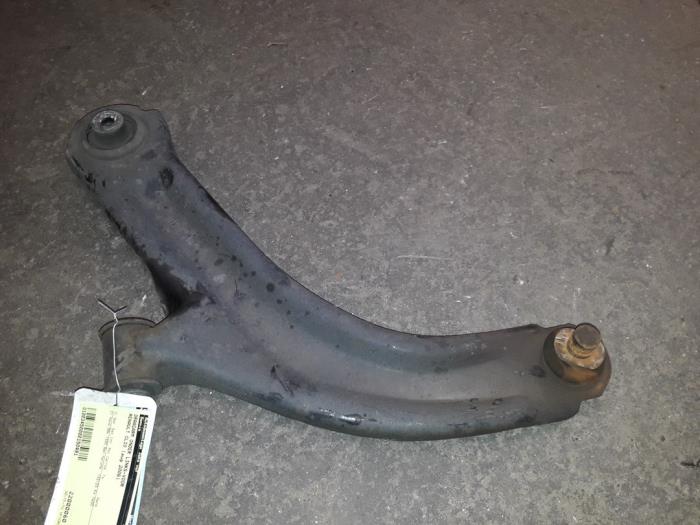Front lower wishbone, left from a Renault Clio III (BR/CR) 1.4 16V 2006