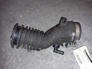 Used Air intake hose Renault Clio III (BR/CR) 1.4 16V Price on request offered by Autodemontage Joko B.V.