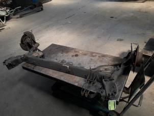 Used Rear-wheel drive axle Renault Clio III (BR/CR) 1.4 16V Price on request offered by Autodemontage Joko B.V.