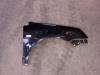 Front wing, right from a Volkswagen Polo IV (9N1/2/3) 1.2 12V 2005