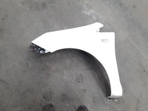 Used Front wing, left Opel Corsa D 1.3 CDTi 16V ecoFLEX Price on request offered by Autodemontage Joko B.V.