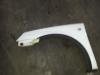 Front wing, left from a Opel Combo (Corsa C) 1.7 DI 16V 2003