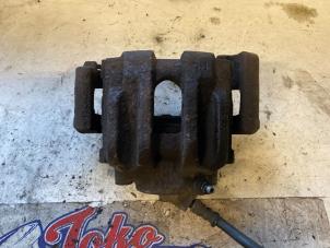 Used Front brake calliper, left BMW 3 serie (E90) 320i 16V Price on request offered by Autodemontage Joko B.V.