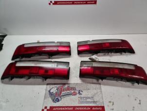 Used Taillight, left Suzuki Swift (SF310/413) 1.0i Price on request offered by Autodemontage Joko B.V.