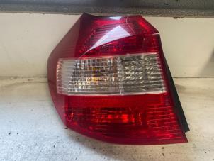 Used Taillight, left BMW 1 serie (E87/87N) 118i 16V Price on request offered by Autodemontage Joko B.V.