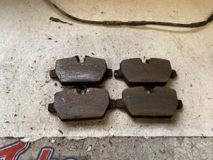 Used Rear brake pad BMW 1 serie (E87/87N) 118i 16V Price on request offered by Autodemontage Joko B.V.