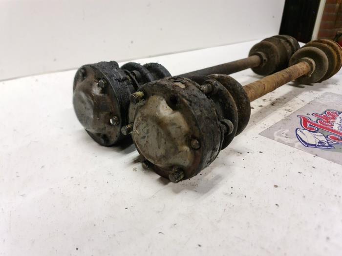 Drive shaft, rear right from a Mercedes-Benz E diesel (W124) 2.5 250 D 1989