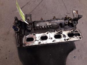 Used Cylinder head Opel Corsa C (F08/68) 1.2 16V Price on request offered by Autodemontage Joko B.V.