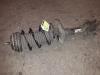 Front shock absorber rod, left from a Opel Corsa D, 2006 / 2014 1.4 16V Twinport, Hatchback, Petrol, 1.364cc, 66kW (90pk), FWD, Z14XEP; EURO4, 2006-07 / 2014-08 2007