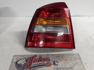 Used Taillight, left Opel Astra G (F08/48) 1.7 DTI 16V Eco4 Price on request offered by Autodemontage Joko B.V.