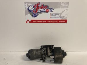 Used Oil filter housing Volkswagen Caddy III (2KA,2KH,2CA,2CH) 1.9 TDI Price on request offered by Autodemontage Joko B.V.