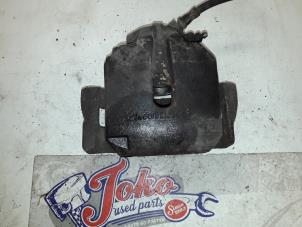 Used Front brake calliper, left BMW 5 serie (E39) 525 tds Price on request offered by Autodemontage Joko B.V.