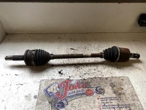 Used Front drive shaft, left Kia Rio III (UB) 1.2 CVVT 16V Price on request offered by Autodemontage Joko B.V.