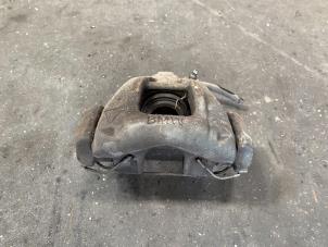 Used Front brake calliper, left BMW Mini One/Cooper (R50) 1.6 16V One Price on request offered by Autodemontage Joko B.V.