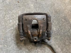 Used Front brake calliper, right Opel Corsa C (F08/68) 1.2 16V Twin Port Price on request offered by Autodemontage Joko B.V.