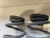 Rear coil spring from a Volkswagen Polo IV (9N1/2/3) 1.2 2006