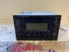 Radio CD player from a Volkswagen Passat (3B3) 1.9 TDI 130 2004