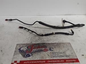 Used Power steering line Volkswagen Fox (5Z) 1.2 Price on request offered by Autodemontage Joko B.V.