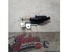 Tailgate motor from a Ford Fiesta 5 (JD/JH), 2001 / 2009 1.4 16V, Hatchback, Petrol, 1.388cc, 59kW (80pk), FWD, FXJA; EURO4, 2001-11 / 2008-10, JD3 2006