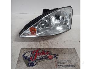 Used Headlight, left Ford Focus 1 1.8 TDCi 115 Price on request offered by Autodemontage Joko B.V.
