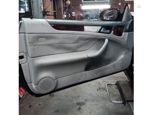 Used Door trim 2-door, left Mercedes CLK (W208) 2.0 200K Evo 16V Price on request offered by Autodemontage Joko B.V.