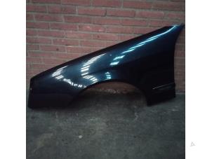 Used Front wing, left Mercedes CLK (W208) 2.0 200K Evo 16V Price on request offered by Autodemontage Joko B.V.