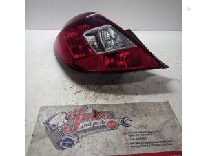 Used Taillight, left Opel Corsa D 1.4 16V Twinport Price on request offered by Autodemontage Joko B.V.