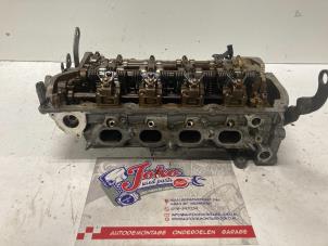 Used Cylinder head Peugeot 207/207+ (WA/WC/WM) 1.6 16V VTRi Price on request offered by Autodemontage Joko B.V.