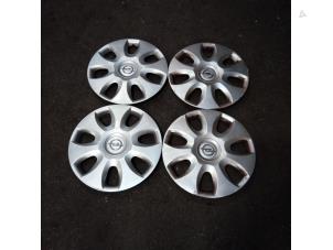 Used Wheel cover set Opel Corsa D 1.4 16V Twinport Price on request offered by Autodemontage Joko B.V.