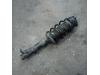 Front shock absorber rod, left from a Ford Fiesta 5 (JD/JH) 1.3 2007