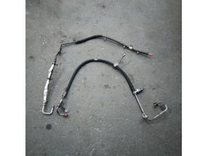 Used Power steering line Ford Fiesta 5 (JD/JH) 1.3 Price on request offered by Autodemontage Joko B.V.
