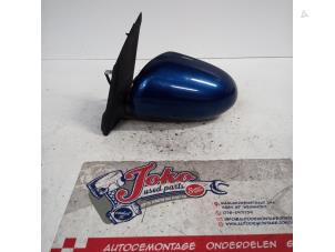 Used Wing mirror, left Daihatsu Cuore (L251/271/276) 1.0 12V DVVT Price on request offered by Autodemontage Joko B.V.
