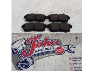 Used Front brake pad Daihatsu Cuore (L251/271/276) 1.0 12V DVVT Price on request offered by Autodemontage Joko B.V.
