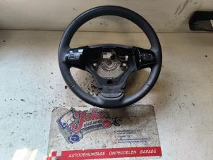Used Steering wheel Opel Corsa D 1.2 16V Price on request offered by Autodemontage Joko B.V.
