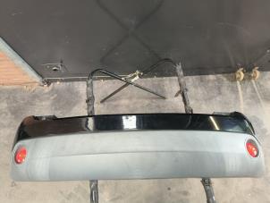 Used Rear bumper Ford Fiesta 5 (JD/JH) 1.3 Price on request offered by Autodemontage Joko B.V.