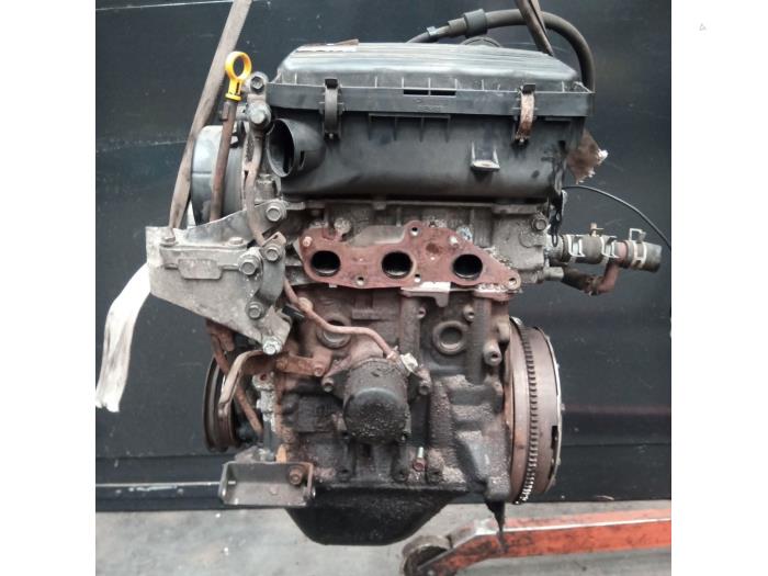 Engine from a Daihatsu Cuore (L251/271/276) 1.0 12V DVVT 2005