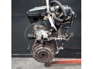 Engine from a Daihatsu Cuore (L251/271/276) 1.0 12V DVVT 2005