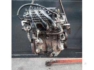 Engine from a Daihatsu Cuore (L251/271/276) 1.0 12V DVVT 2005